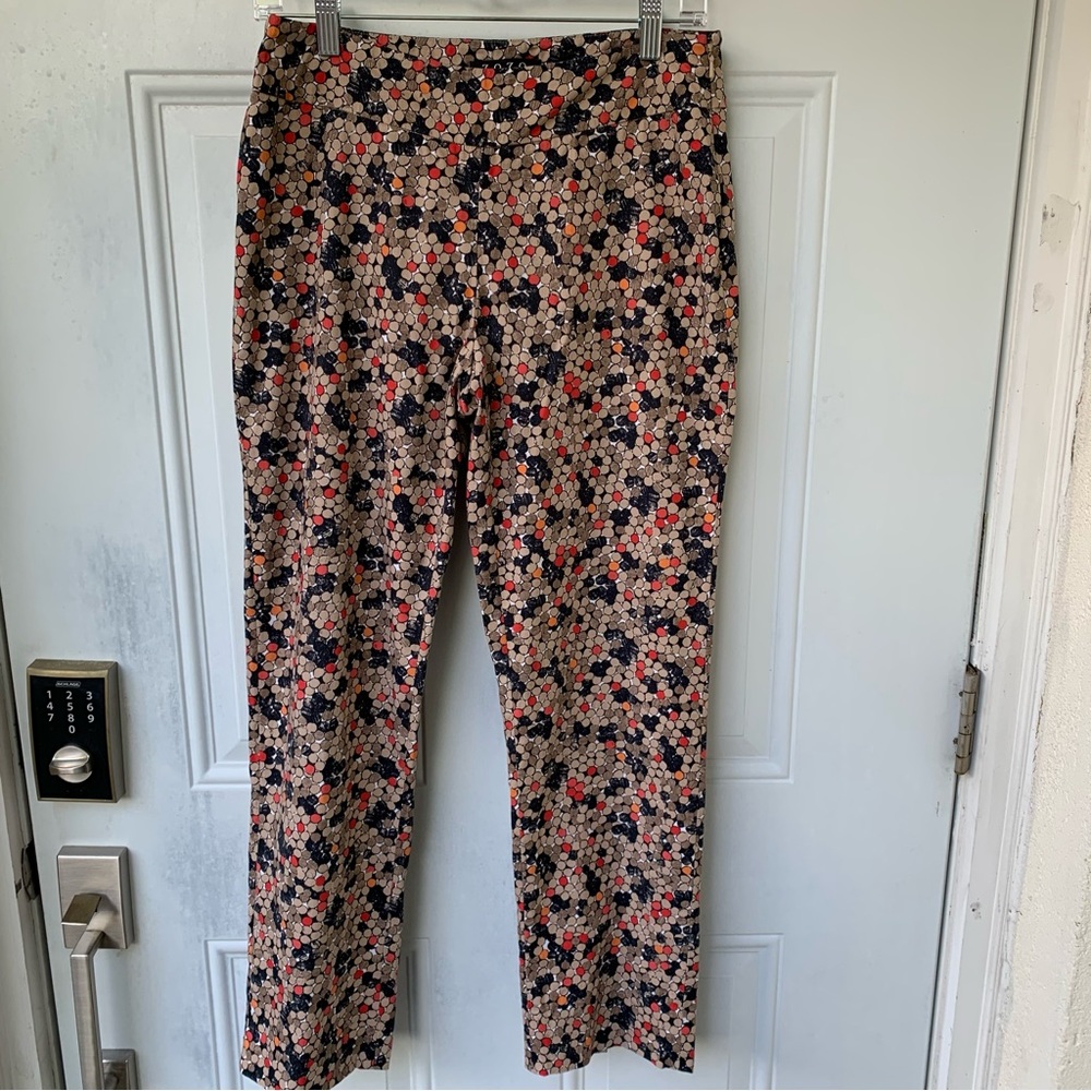 ZOZO. Tan pants w/multiple colored geo prints, zipper on side.Stretch ma…